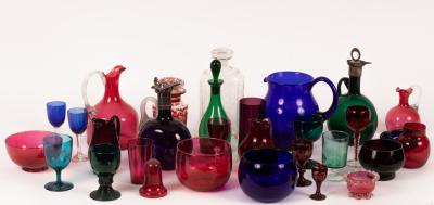 A collection of coloured glass drink