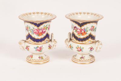 A pair of Continental porcelain small