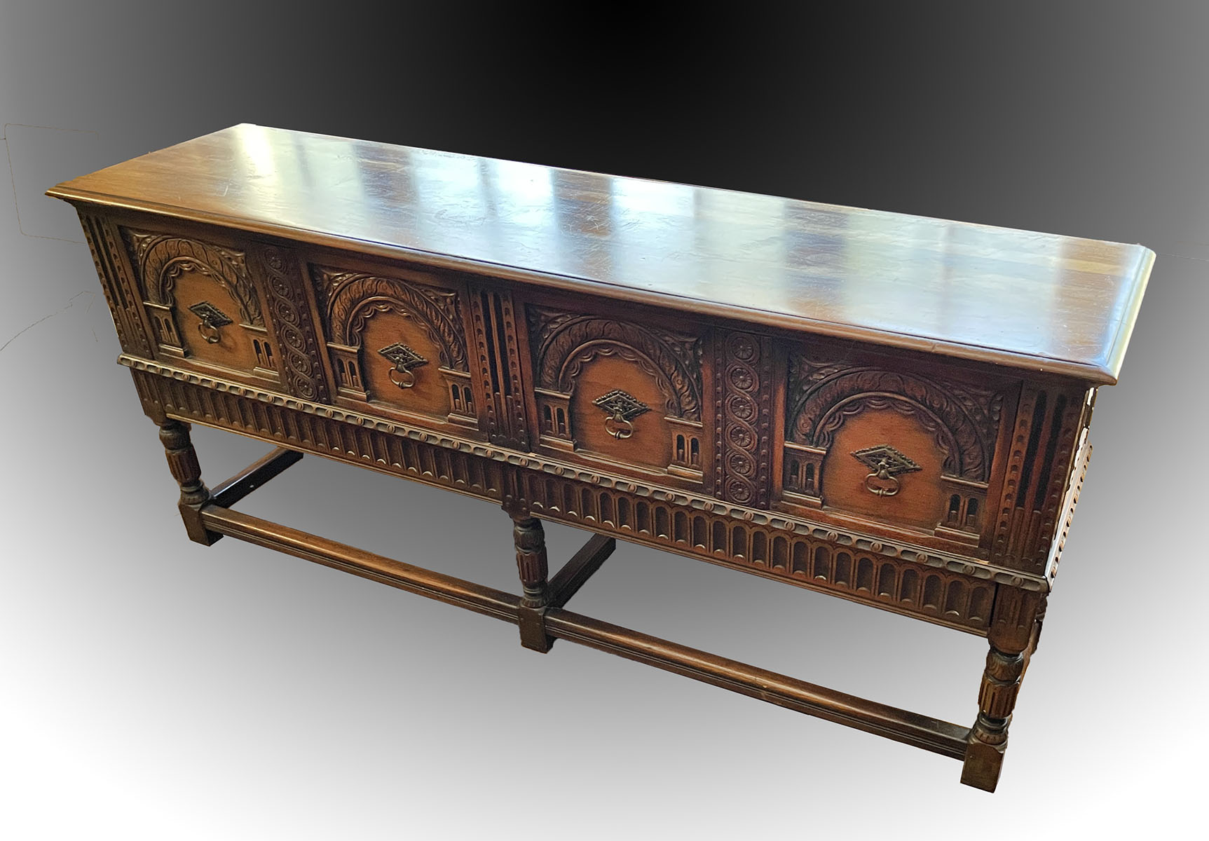 CARVED JACOBEAN STYLE KITTINGER SIDEBOARD: