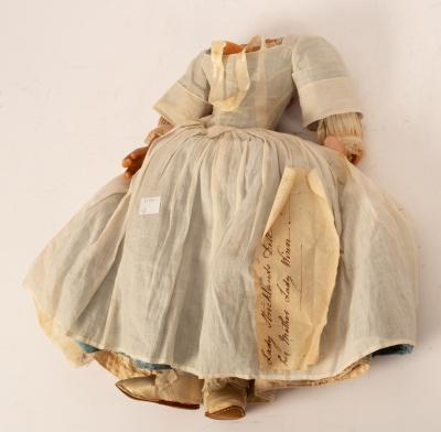 A wax headed and shouldered doll,