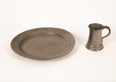 A large pewter charger, 49cm diameter