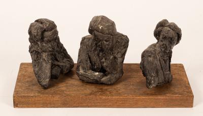 Three bronze busts, studies of a pensive