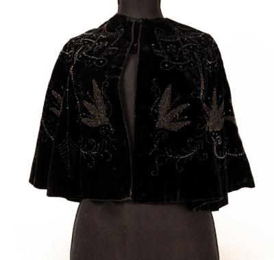 A Victorian black velvet cape with