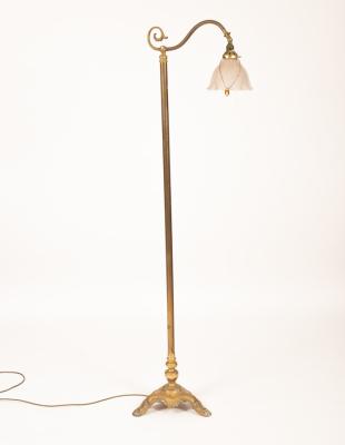 A brass standard lamp with clear