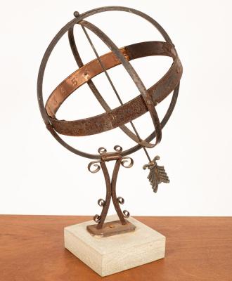 An Armillary sphere on a square stone