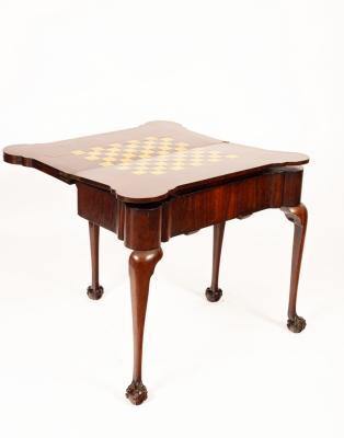 A George II style mahogany games and