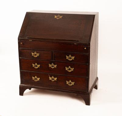 A George II oak bureau with fall-front