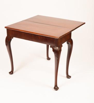 A George II mahogany tea table  36b4c0
