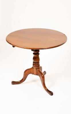 A George III style oak tripod table,