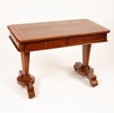 A William IV walnut writing table,