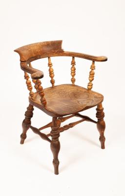 An early 20th Century elbow chair