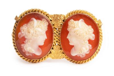 A late 19th Century double cameo brooch,