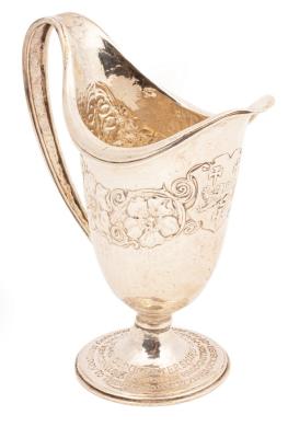 An Arts & Crafts silver jug, Omar