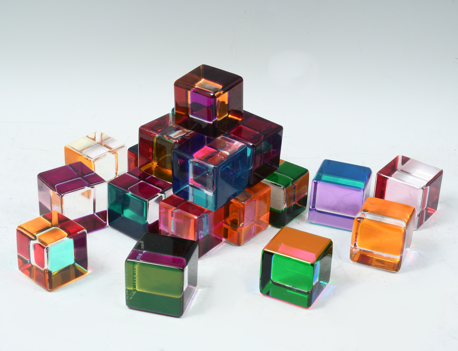 TWENTY-ONE MULTICOLOR LUCITE CUBES: