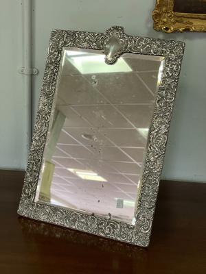 A silver easel back mirror, CD,