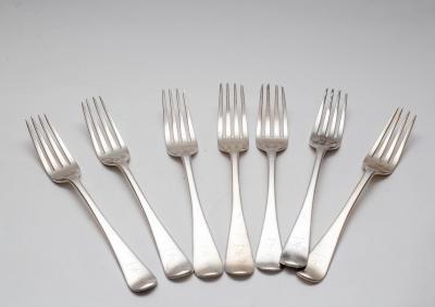 A matched set of seven silver forks  36b79b