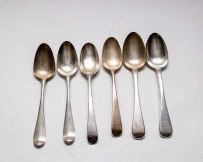 Four assorted silver spoons, marks worn,