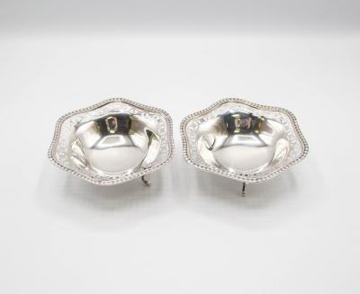 A pair of silver bonbon dishes,