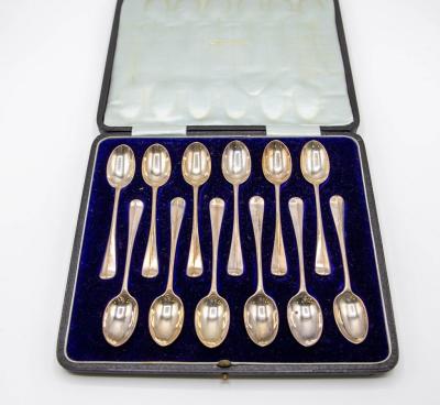 A set of twelve silver rattail