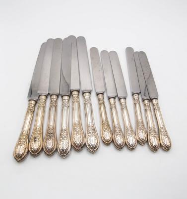 A set of Victorian silver handled knives,