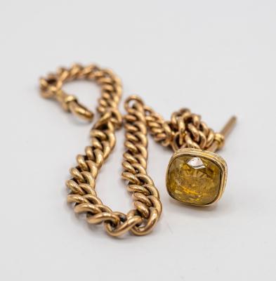 A 9ct gold Albert chain with T bar 36b897