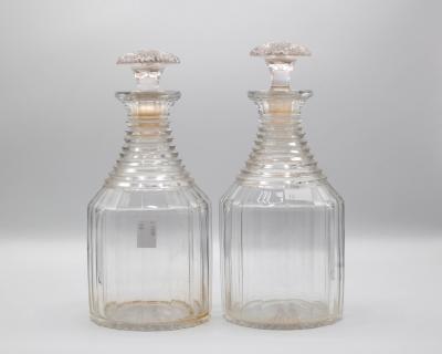 A pair of decanters and stoppers with