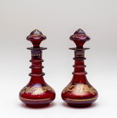 A pair of ruby glass liqueur bottles 36b8ae