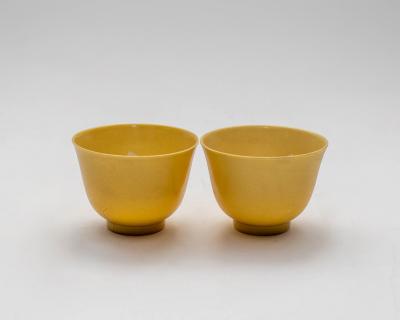 A pair of Chinese yellow glazed 36b8ed