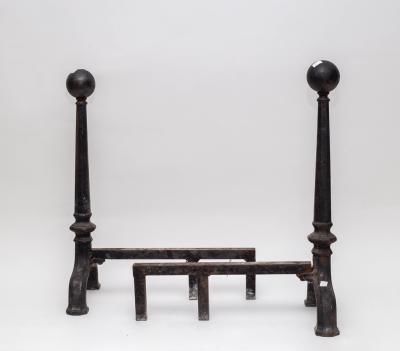 A pair of iron fire dogs, 17th Century