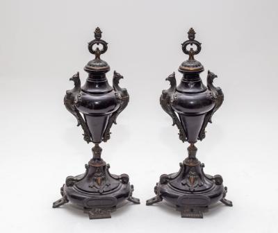 A pair black marble garniture urns,