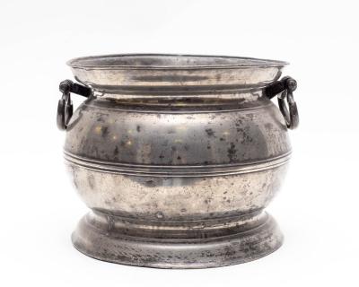 A pewter two-handled chamber pot,