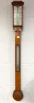 An oak cased stick barometer by
