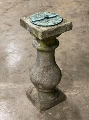 A sundial on baluster column support,