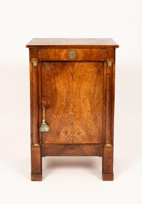 An Empire style plinth cupboard