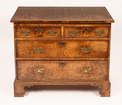 A George III burr elm chest of 36ba28