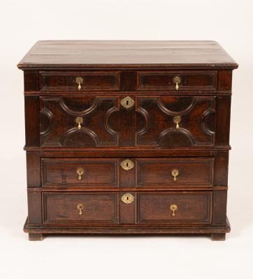 A Charles II oak chest of drawers with