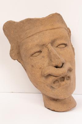 A large Mexican pottery head fragment,