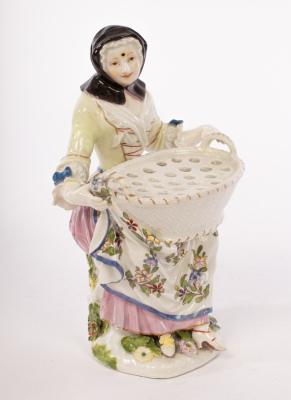 A Meissen figural flower holder,