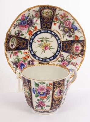 A Worcester fluted coffee cup and saucer,