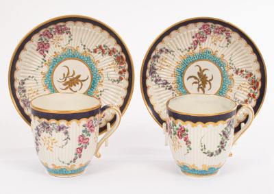 A pair of Worcester fluted coffee cups