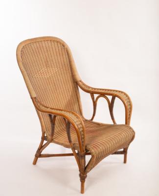 A Dryad rattan chair with arched