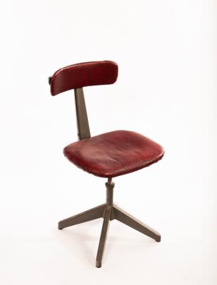 An industrial adjustable chair,