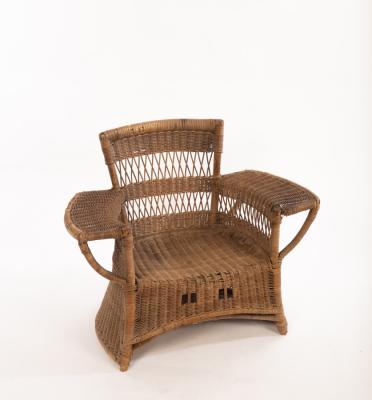 A childs rattan armchair by Dryad,