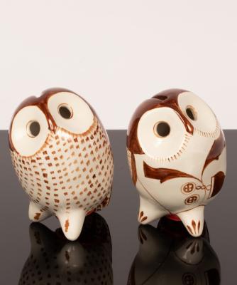 A pair of novelty pottery money