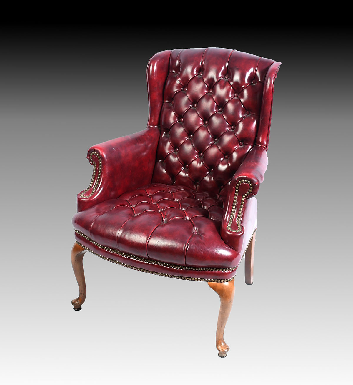 RED LEATHER CHESTERFIELD CHAIR: