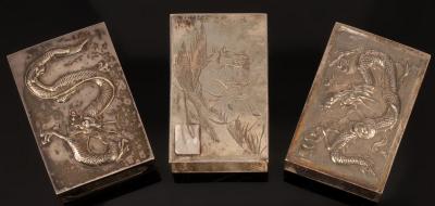 Three Chinese silver match boxes,