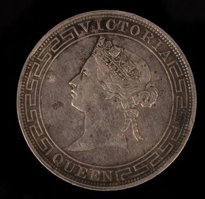 A Hong Kong silver coin with '1866,