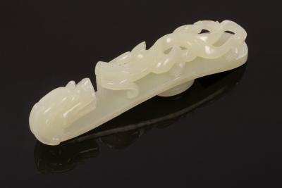 A Chinese white jade carved belt