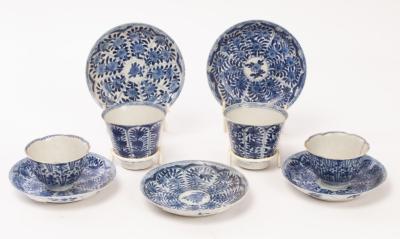 Two blue and white teabowls and