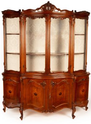 A serpentine fronted display cabinet  36c131